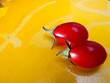 Organic red Tomato wit yellow background for isolation