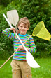 The boy with oars and a net outdoor