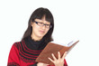 Young woman reads book.