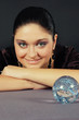 Beautiful witch with magic sphere Beautiful witch with magic sphere