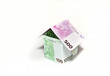 House made from euro bills on white background House made from euro bills on white background