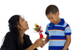 small boy apologising to his mother