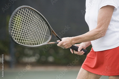 Photo: Senior womn ready to hit the ball Senior womn ready to hit the ball