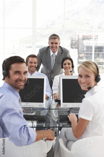 Photo: Happy people at work Happy people at work
