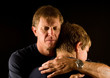 Photo: emotional embrace - father hugging son emotional embrace - father hugging son