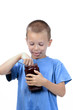 kid is eating marmelade