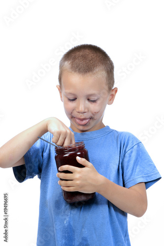 Photo: kid is eating marmelade kid is eating marmelade