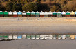 Beach huts reflection