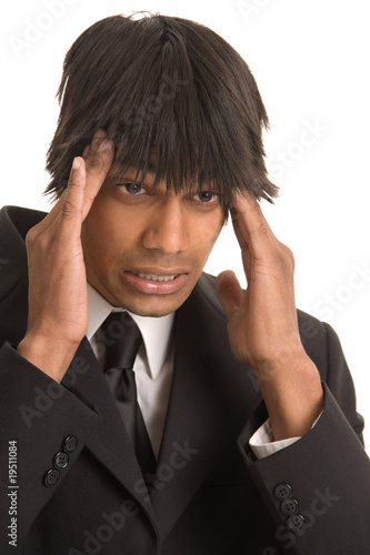 Photo: Business Man with Headache Business Man with Headache