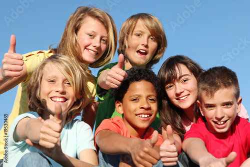 Photo: group of happy youth club or summer camp kids group of happy youth club or summer camp kids