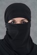 Eine muslimische Frau in Burka. Sample text.