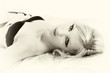 Photo: sepia portrait laying down sepia portrait laying down