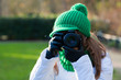 Woman making photo outdoor
