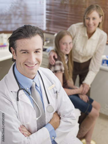 Photo: Doctor with patient and her mother in doctor?s office Doctor with patient and her mother in doctor?s office