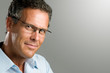 Smiling mature man with glasses