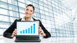 Business woman showing growing chart