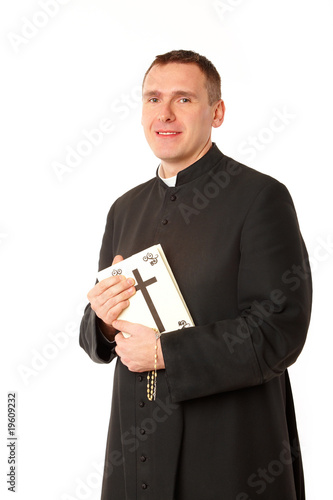 Foto: Happy young priest Happy young priest