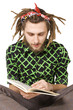 young dreadlock man reading book isolated young dreadlock man reading book isolated