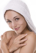 Closeup portrait of young beautiful woman after bath