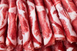 Cutting sausage and cured meat on a celebratory table