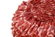Cutting sausage and cured meat on a celebratory table