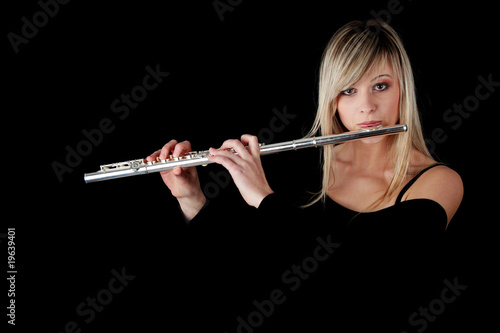 Portrait of a woman playing transverse flute