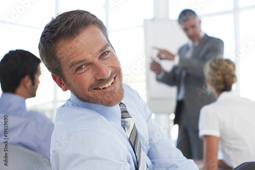 Photo: Happy businessman close up Happy businessman close up