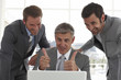 Mature businessman showing ok sign