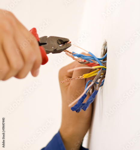 Photo: Handyman working closeup Handyman working closeup