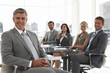 Senior executive with his team