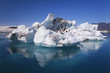 Iceberg and Reflection on the Lagoon, Jokulsarlon, Iceland
