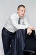 Young businessman based on the office chair.