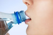 Young woman drinking water