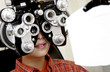 Boy getting eye exam
