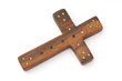 old wooden cross decorated with beads isolated