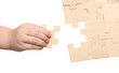 Foto: mens and childs hands finishing puzzles mens and childs hands finishing puzzles
