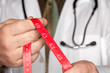 Doctor with Stethoscope Holding Measuring Tape Doctor with Stethoscope Holding Measuring Tape