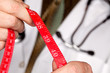 Doctor with Stethoscope Holding Measuring Tape Doctor with Stethoscope Holding Measuring Tape
