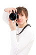 Photographer in white holding phone camera