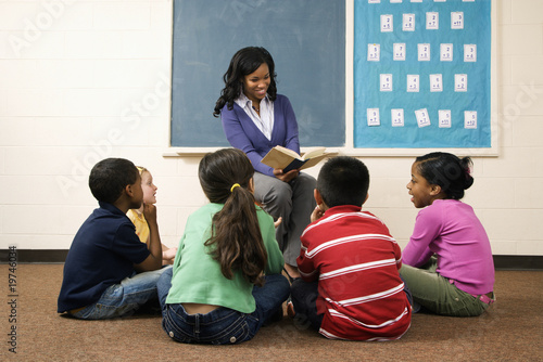 Photo: Teacher Reading to Students Teacher Reading to Students