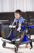 Photo: Disabled child in walker Disabled child in walker
