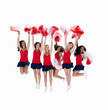 Squad of six sexy cheerleaders jumping in the air against white