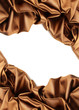Rich golden brown satin fabric on white Rich golden brown satin fabric on white