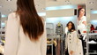 Video: Pretty girl in a mall trying out the clothes in fitting room Pretty girl in a mall trying out the clothes in fitting room