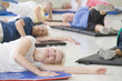 Women on exercise mats