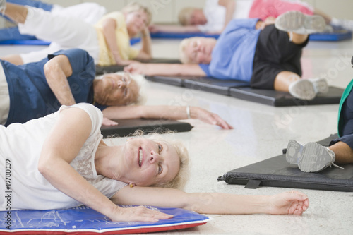 Photo: Women on exercise mats Women on exercise mats