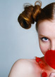 Young pretty lovely girl holding a lollipop
