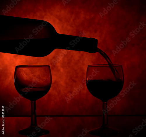 Photo: Wine poured into a glass Wine poured into a glass