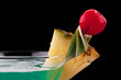 Cocktail drink on fruit/ isolated