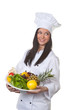 Cook served a bowl of fruit and vegetables